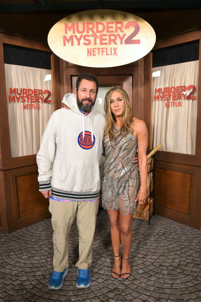 jennifer aniston silver mini dresslos angeles, california march 28 l r adam sandler and jennifer aniston attend the netflix premiere of murder mystery 2 on march 28, 2023 in los angeles, california photo by charley gallaygetty images for netflix