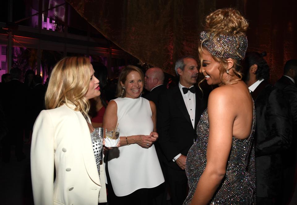 Reese Witherspoon and Katie Couric appear to be asking Ciara if they can see her "One, Two, Step" later at the <em>Vanity Fair </em>party.