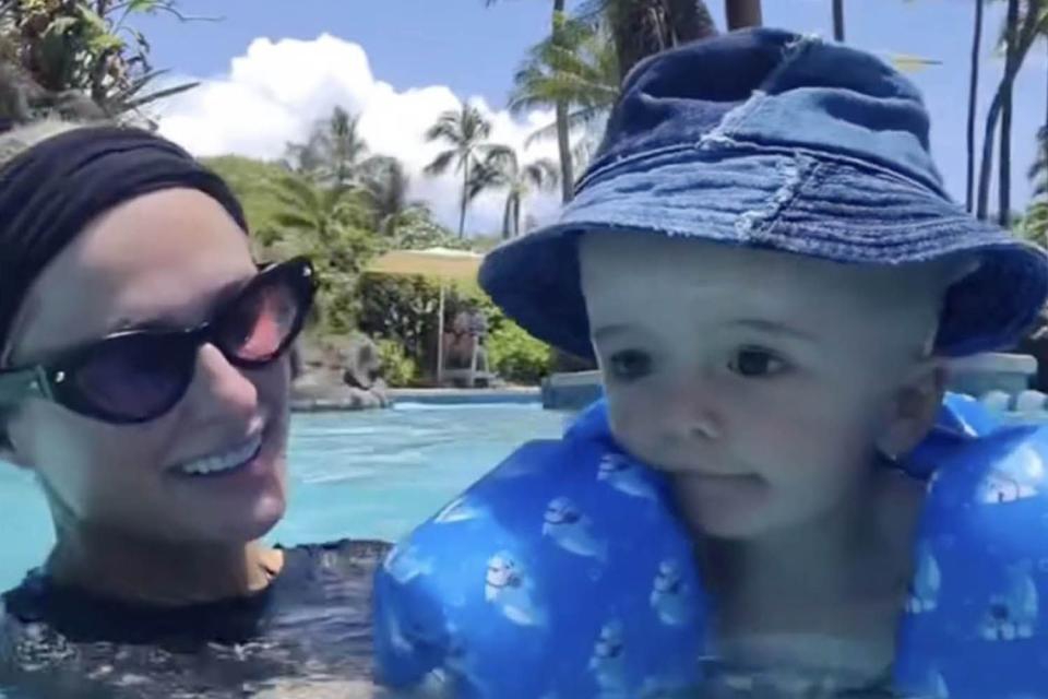 <p>Paris Hilton/Instagram</p> Paris Hilton and son Phoenix swimming in Hawaii