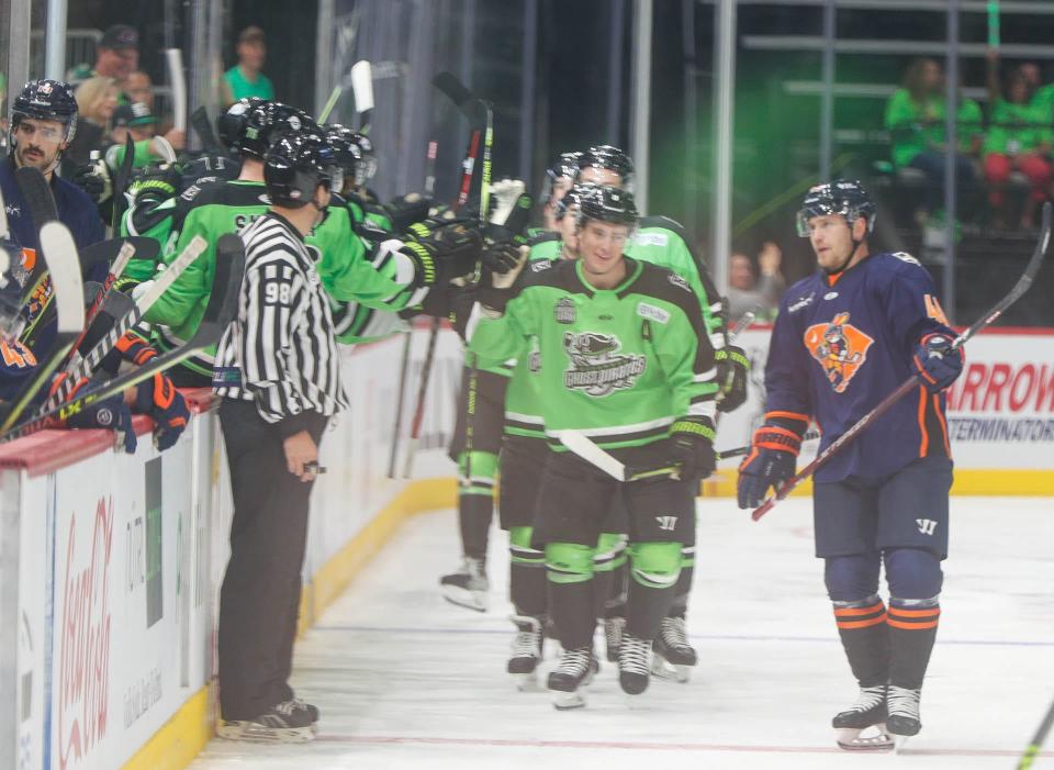 Spencer Naas gets fist bumps from the bench after scoring the first goal at enmarket Arena during the Savannah Ghost Pirates home opener on Saturday November 5, 2022 against the Greenville Swamp Rabbits.