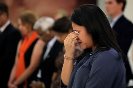 Family member reacts during a commemoration ceremony in memory of the victims of the Malaysia Airlines flight MH17 plane crash on the fifth anniversary of the accident, at the Australian High Commission in Kuala Lumpur