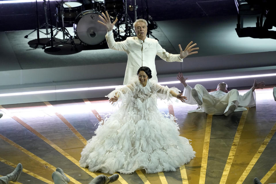 Stephanie Hsu, front center, and David Byrne perform the song "This is the Life" from "Eveything Everywhere All at Once" at the Oscars on Sunday, March 12, 2023, at the Dolby Theatre in Los Angeles. (AP Photo/Chris Pizzello)