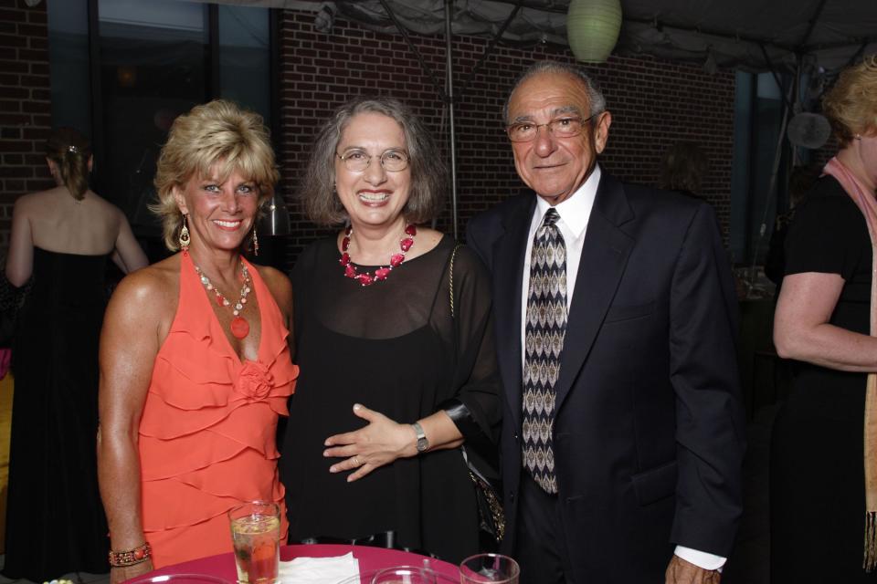 Anthony Fusco, who donated to the Delaware Art Museum, joins Lyvonne Rustemis of Wilmington, left, and Danielle Rice, director of the museum, at the grand reopening gala at the renovated Delaware Art Museum in Wilmington in 2014.