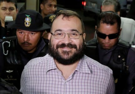 FILE PHOTO: Javier Duarte, former governor of Mexican state of Veracruz, arrives to a court for extradition proceedings in Guatemala City, Guatemala, June 27, 2017.  REUTERS/Luis Echeverria/File Photo