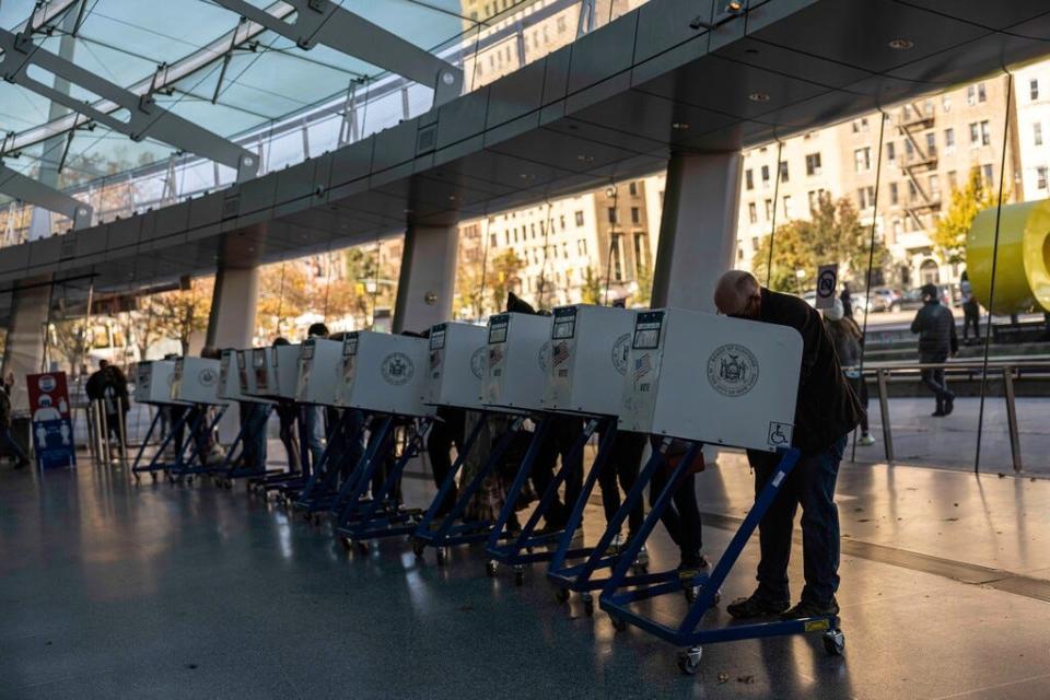 Voters cast their ballots on November 8, 2022 at the Brooklyn Museum in New York City.