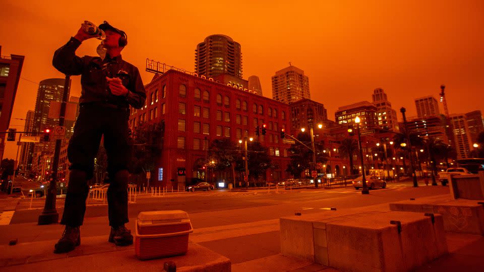 Smoke from northern California wildfires casts a reddish glow in San Francisco, California. - Ray Chavez/MediaNews Group/The Mercury News/Getty Images