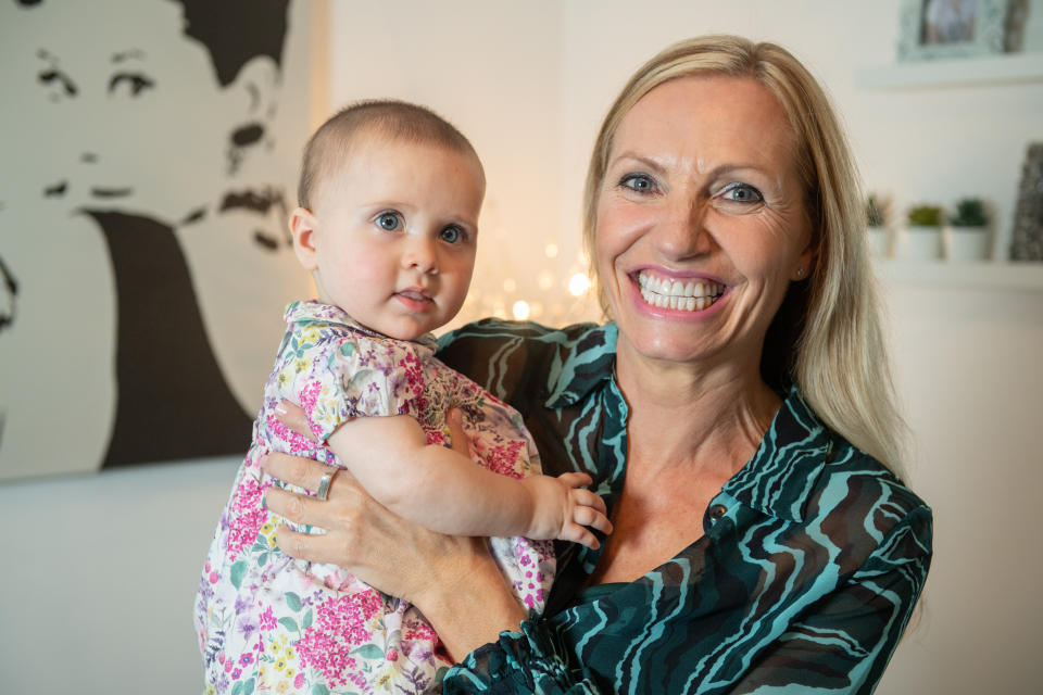 Kelly Clarke welcomed a baby at 50 after undergoing IVF with donor sperm, pictured with baby Lyla Rae Clarke. (Kelly Clarke/SWNS)