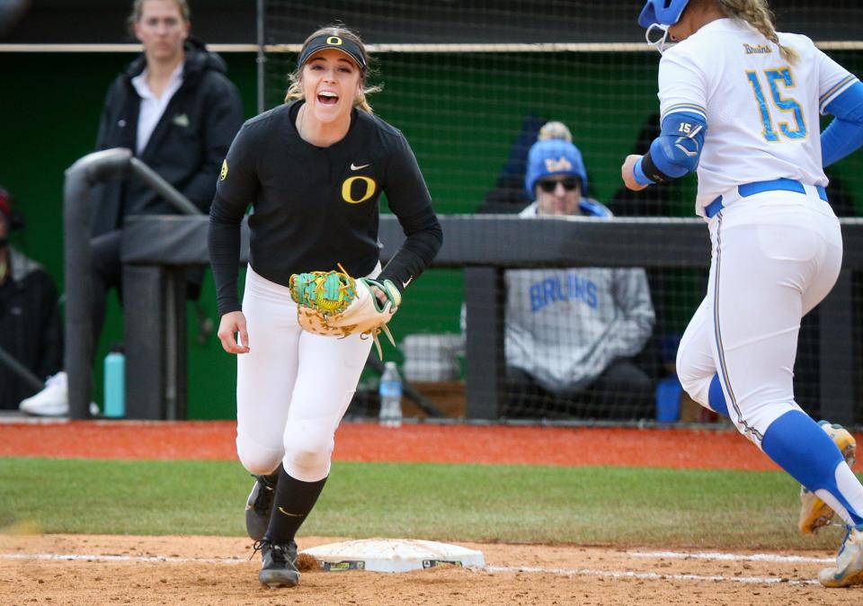 Oregon infielder KK Humphreys runs back to the dugout after an out as the Oregon Ducks fell to UCLA 7-4 on March 25, 2023, at Jane Sanders Stadium in Eugene.