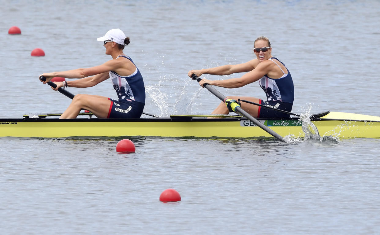 Britain's Heather Stanning (L) and Britain's Helen Glover row to win the Women's Pair final rowing competition at the Lagoa stadium during the Rio 2016 Olympic Games in Rio de Janeiro on August 12, 2016. / AFP / Damien MEYER        (Photo credit should read DAMIEN MEYER/AFP via Getty Images)