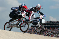 LONDON, ENGLAND - AUGUST 09: Liam Phillips (L) of Great Britain and Connor Fields of the United States race through the course during the Men's BMX Cycling Quarter Finals on Day 13 of the London 2012 Olympic Games at BMX Track on August 9, 2012 in London, England. (Photo by Bryn Lennon/Getty Images)