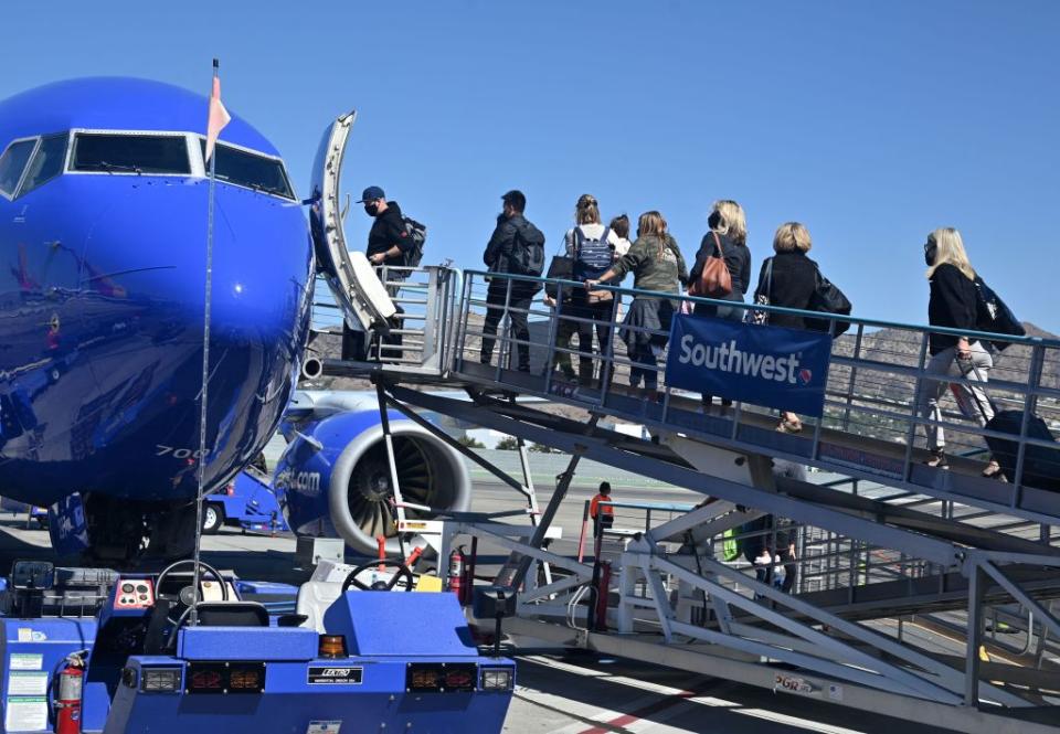 A long pre-boarding line can leave frequent flyers with limited options near the front of the plane. AFP via Getty Images