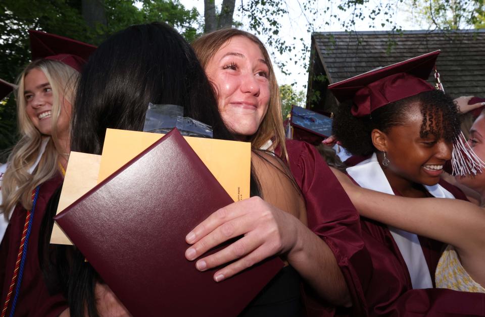 Talia Donahue has tears of joy during the West Bridgewater Middle-Senior High School graduation at War Memorial Park on Friday, May 26, 2023. 
