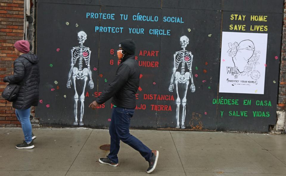 Bilingual murals by artist Shawn Dunwoody are part of the city's "Protect Your Circle" effort.