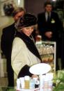 <p>Princess Diana browsed the merchandise in a department store in Germany in 1987. The Princess of Wales stopped by the store while in the country for an official royal visit. </p>