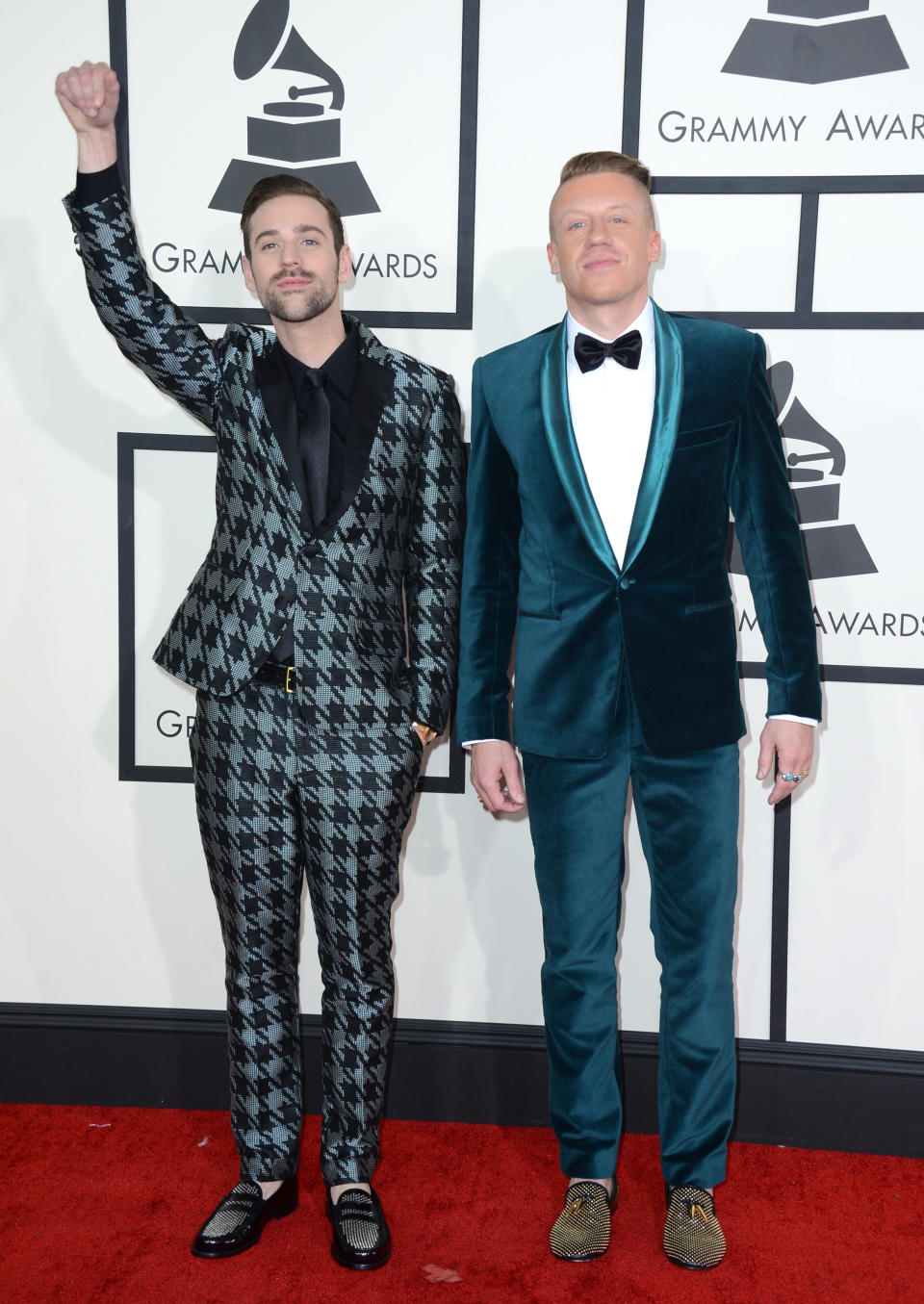 Ryan Lewis, left, and Macklemore arrive at the 56th annual Grammy Awards at Staples Center on Sunday, Jan. 26, 2014, in Los Angeles. (Photo by Jordan Strauss/Invision/AP)