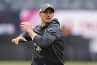 FILE - In this Oct. 20, 2019, file photo, New Orleans Saints quarterback Drew Brees works on the field before the team's NFL football game against the Chicago Bears in Chicago. As New Orleans (6-1) prepares to put its five-game winning streak on the line against the surging Arizona Cardinals (3-3-1) on Sunday, coach Sean Payton must decide if now is the right time to bring back Brees in place of Teddy Bridgewater. (AP Photo/Charles Rex Arbogast, File)