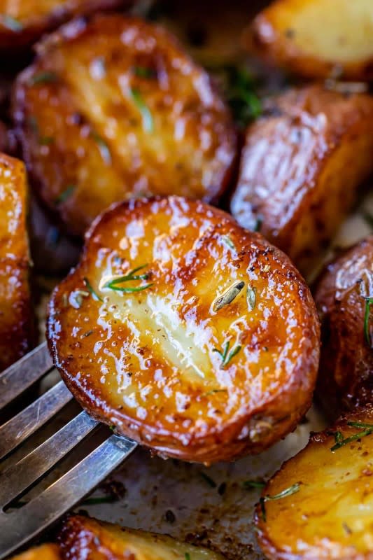 <p>The Food Charlatan</p><p>These baby red potatoes come out tender in the middle and oh-so-crispy on the outside, every time.</p><p><strong>Get the recipe: <a href="https://thefoodcharlatan.com/roasted-red-potatoes/" rel="nofollow noopener" target="_blank" data-ylk="slk:Easy Roasted Red Potatoes;elm:context_link;itc:0;sec:content-canvas" class="link ">Easy Roasted Red Potatoes</a></strong></p>