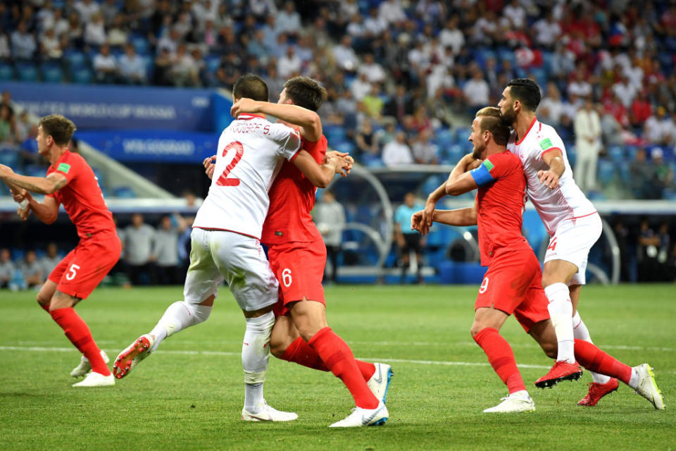 Kane struggles to escape the attention of Tunisia’s defence. (GETTY)