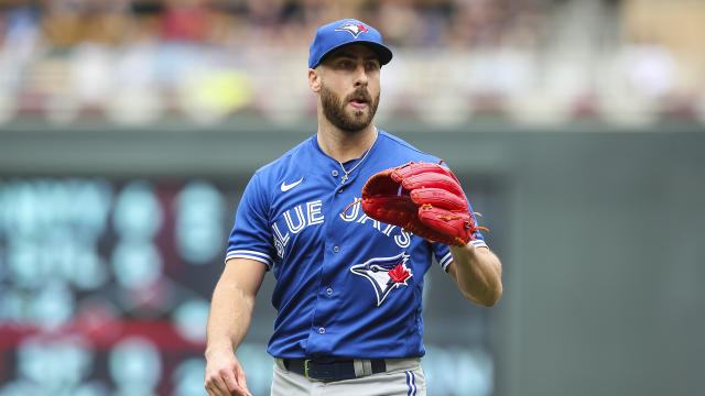 View of a Toronto Blue Jays logo on a jersey worn by a member of