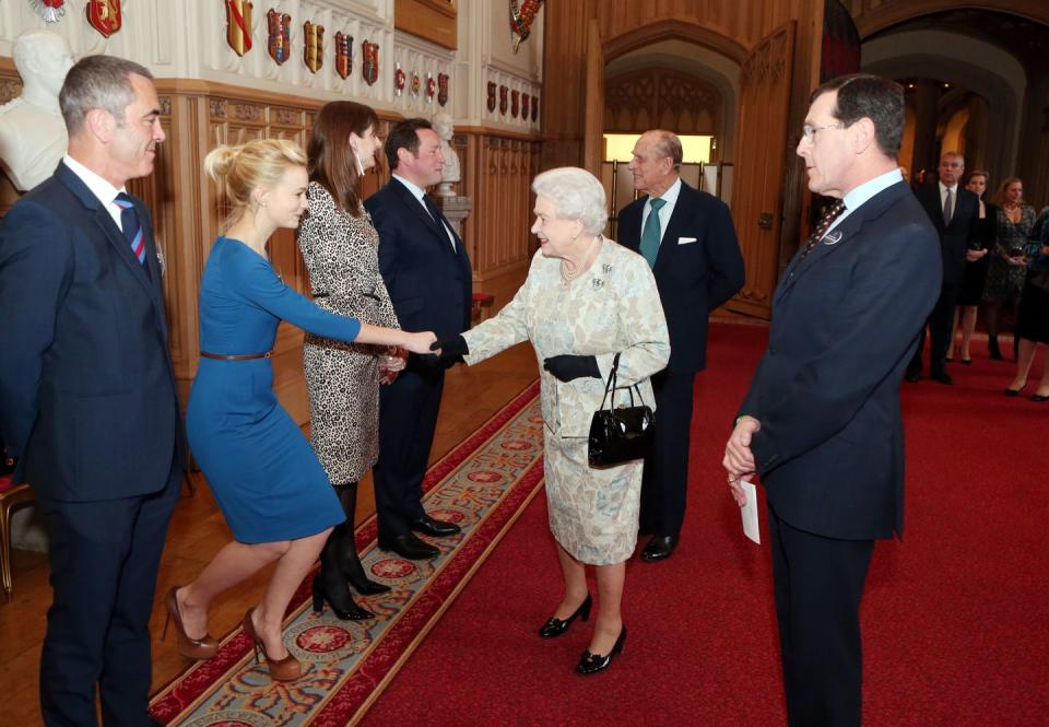 <p>Nothing to see here, just another actress wearing another dark blue dress to meet the Queen. Carey Mulligan’s belted number is on the more casual side of the spectrum.</p>