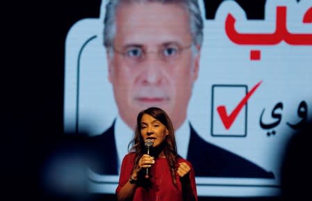 Salwa Karoui, wife of detained Tunisian media mogul and presidential candidate Nabil Karoui, speaks during an election campaign rally in Tunis