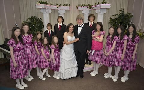 David and Louise Turpin with their children as the couple renew their vows in 2015 - Credit: Facebook