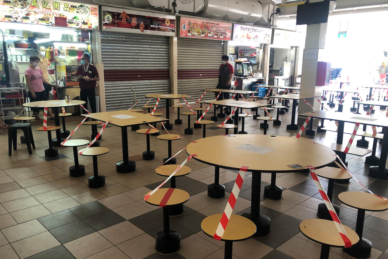 Cordoned off seats seen at the Empress Market and Food Centre on 16 April 2020, Day 10 of Singapore's partial lockdown. (PHOTO: Dhany Osman / Yahoo News Singapore)