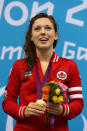 LONDON, ENGLAND - AUGUST 31: Gold medallist Summer Ashley Mortimer of Canada poses on the podium during the medal ceremony for the Women's 50m Freestyle - S10 Final on day 2 of the London 2012 Paralympic Games at Aquatics Centre on August 31, 2012 in London, England. (Photo by Clive Rose/Getty Images)