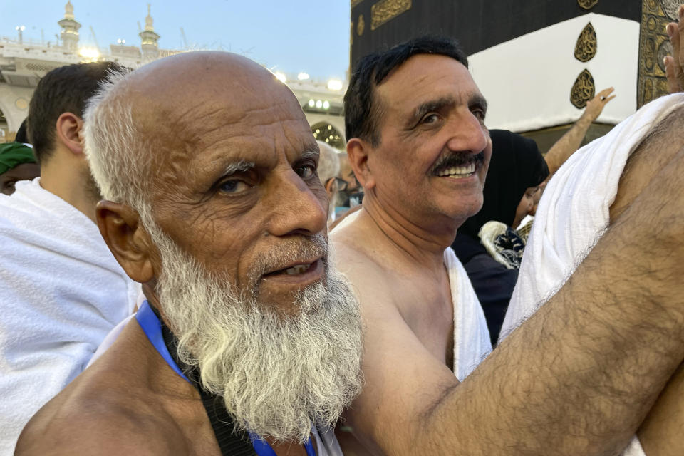 Pakistani pilgrims circumambulate around the Kaaba, the cubic building at the Grand Mosque, during the annual hajj pilgrimage in Mecca, Saudi Arabia, Monday, June 26, 2023, before heading to Mina in preparation for the Hajj, the fifth pillar of Islam and one of the largest religious gatherings in the world. (AP Photo/Amr Nabil)