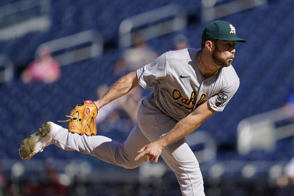 Oakland Athletics starting pitcher Ken Waldichuk follows through on a pitch to the Washington Nationals in the first inning of a baseball game, Thursday, Sept. 1, 2022, in Washington. (AP Photo/Patrick Semansky)