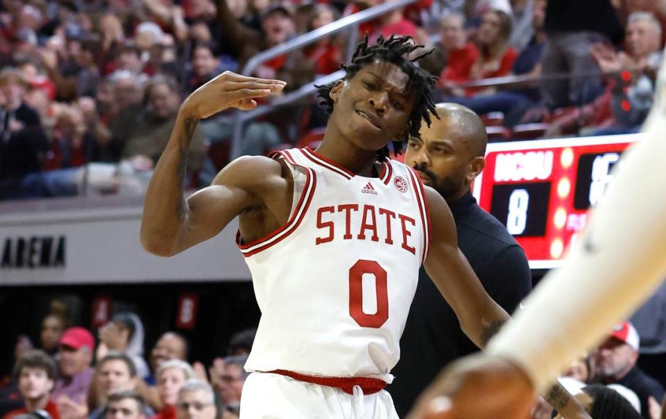 N.C. State’s Terquavion Smith (0) celebrates after making a three-pointer during the first half of N.C. State’s game against Coppin State at Reynolds Coliseum in Raleigh, N.C., Tuesday, Dec. 6, 2022.