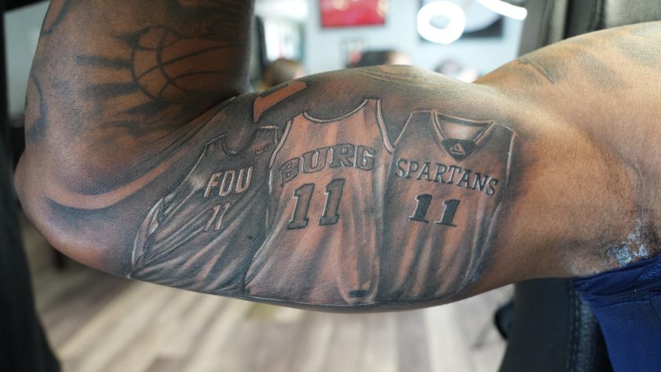 Farleigh Dickinson forward Sean Moore has tattoos of three jerseys on his bicep, including one representing Reynoldsburg High School.