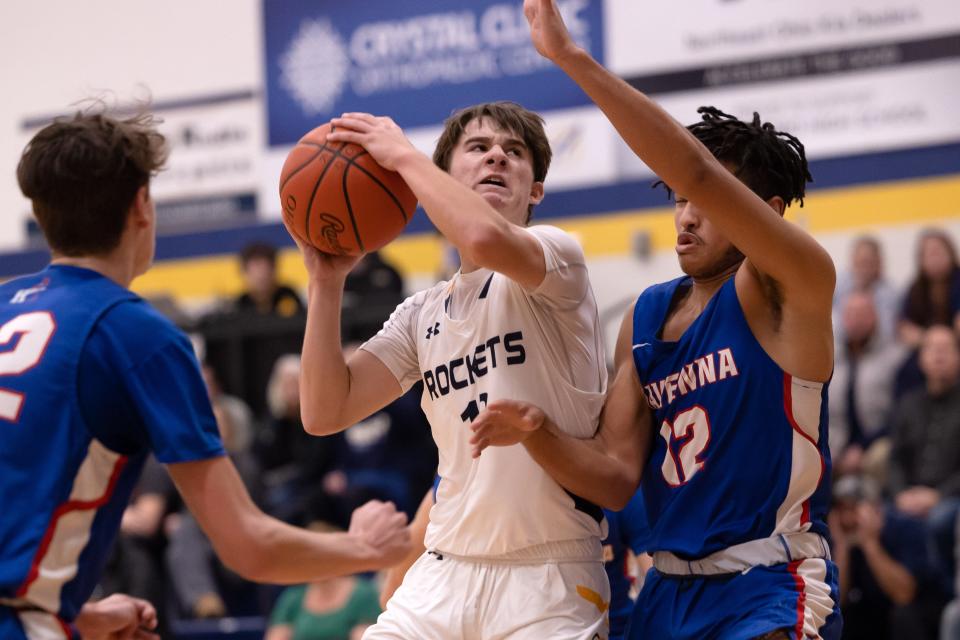 Streetsboro sophomore guard Jack Batten battles to the basket during Tuesday night’s basketball game against the Ravenna Ravens in Streetsboro.