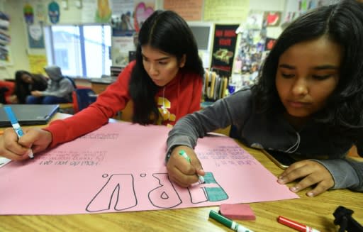 Students work on posters about sexual health at James Monroe High School in the Los Angeles suburb of North Hills