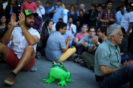 Demonstrators gather as they participate in the March for Science rally on Earth Day, in Santiago, April 22, 2017. REUTERS/Ivan Alvarado