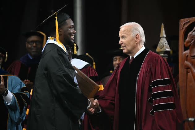 Biden shakes hands with Fletcher during Morehouse's graduation ceremony in Atlanta on May 19, 2024. Fletcher called for a cease-fire in Gaza during his commencement speech.