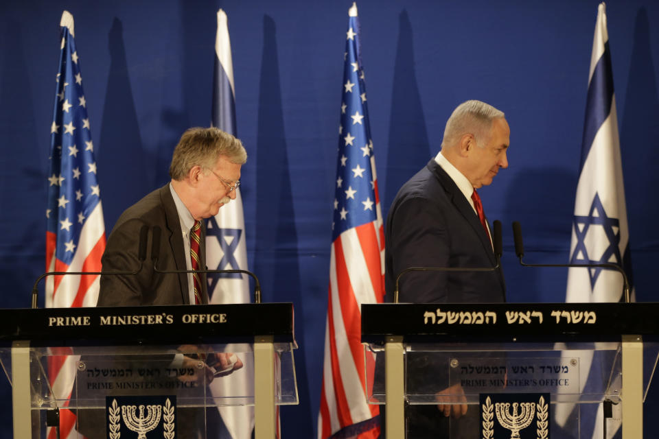 Israeli Prime Minister Benjamin Netanyahu, right, and US National Security Advisor John Bolton, leave the stage after their statement to the media follow their meeting, in Jerusalem, Sunday, Jan. 6, 2019. (AP Photo/Oded Balilty, Pool)