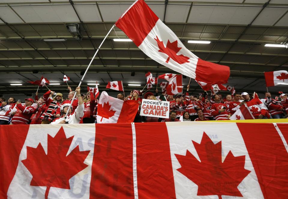 Canadian supporters cheer before Canada plays Switzerland in their quarter-final IIHF World Junior Championship ice hockey game in Malmo