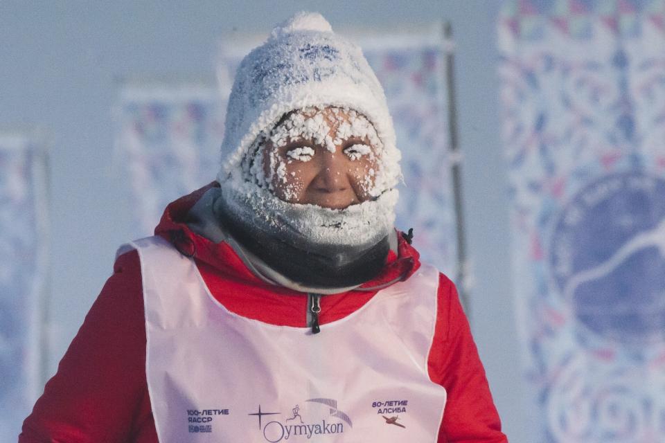 A runner takes part in the International World's coldest marathon at minus 53 degrees (-63.4 Fahrenheit) near Oymyakon, the republic of Sakha, also known as Yakutia, Russian Far East, Saturday, Jan. 22, 2022. Sixty five runners, including athletes from the United Arab Emirates, United States and Belarus, started the run at extremely low temperature in Oymyakon, Yakutia's Pole of Cold. (AP Photo/Ivan Nikiforov)