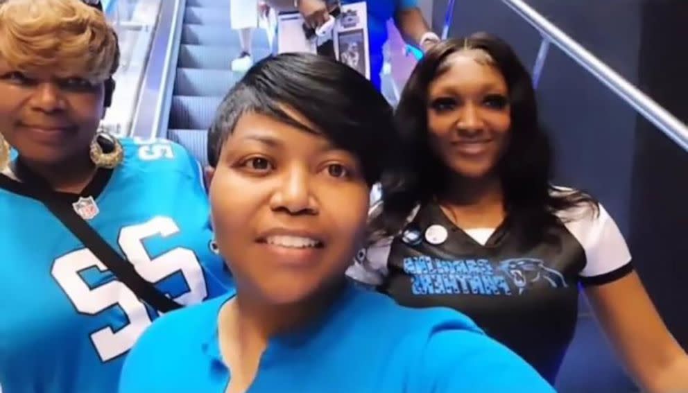 Shanquella Robinson and her mother flank another woman in front of an escalator in what appears to be a selfie.