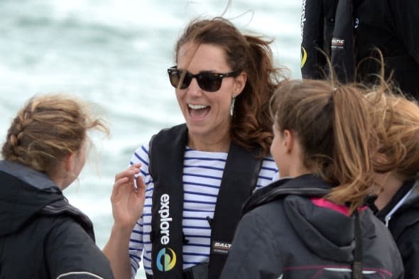 The Duchess of Cambridge speaks with crew as the Duke and Duchess of Cambridge race against each other on two Emirates Team New Zealand Americas Cup yachts as they sail around Auckland Harbour during the fifth day of their official tour to New Zealand. PRESS ASSOCIATION Photo. Picture date: Friday April 11, 2014. Photo credit should read: Anthony Devlin/PA Wire