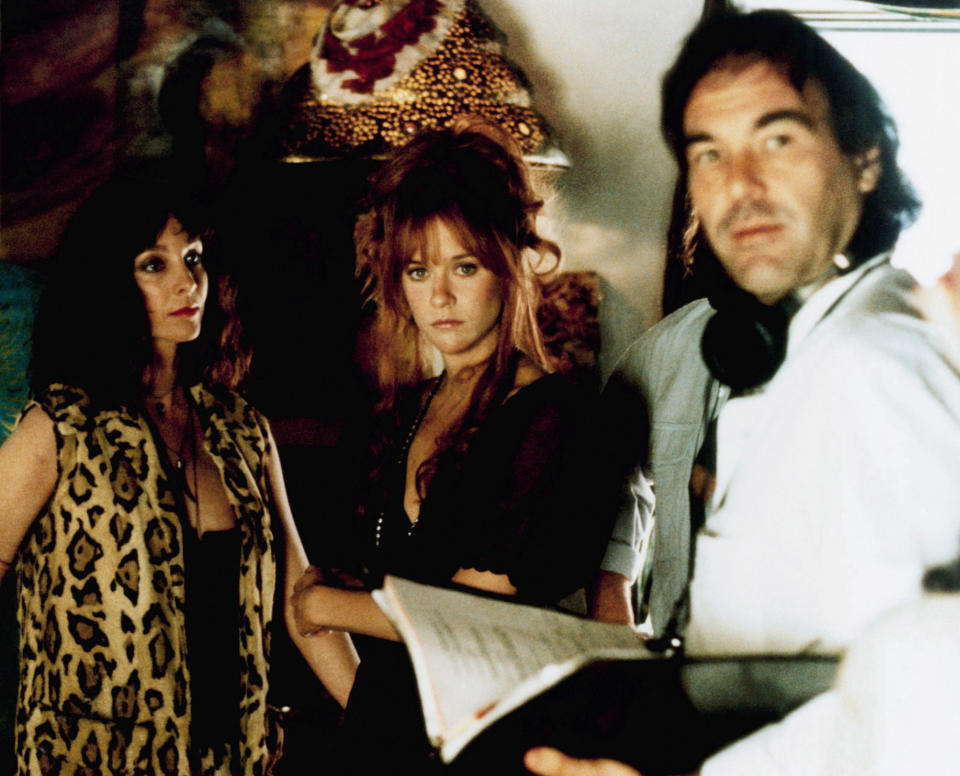 Kathleen Quinlan, Meg Ryan, Oliver Stone on ‘The Doors’ set (1991) - Credit: Everett Collection