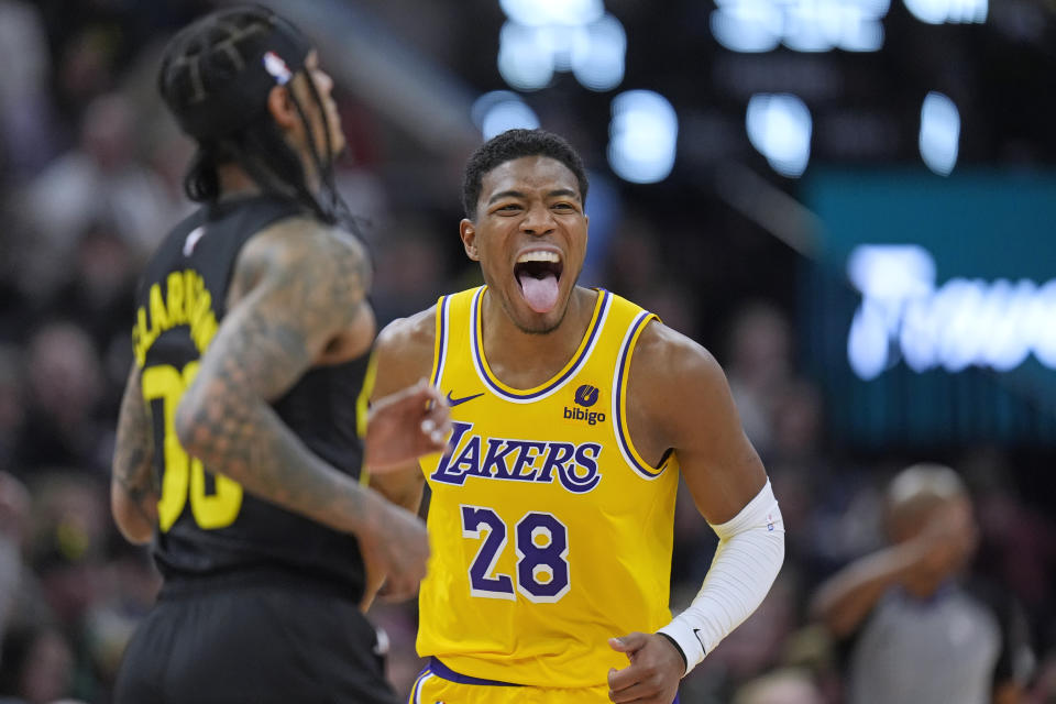 Los Angeles Lakers forward Rui Hachimura (28) reacts after scoring a 3-pointer against the Utah Jazz during the second half of an NBA basketball game Wednesday, Feb. 14, 2024, in Salt Lake City. (AP Photo/Rick Bowmer)