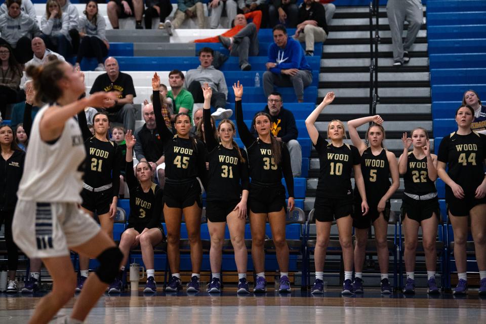 Archbishop Wood girls basketball team stands up for a three-point shot during their PIAA semifinal game against WC Rustin at Bensalem High School on Tuesday, March 21, 2023. The Vikings advanced to the state finals after defeating their opponent 52-35.