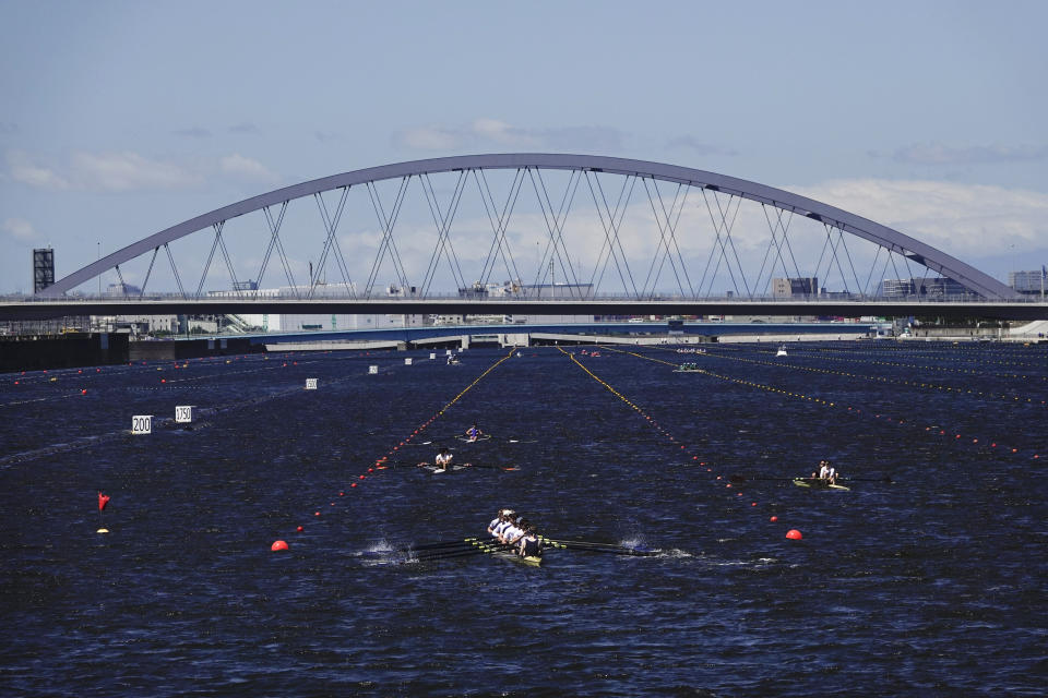 Rowers prepare for a test run at the Sea Forest Waterway, a venue for rowing at the Tokyo 2020 Olympics, Sunday, June 16, 2019, in Tokyo. (AP Photo/Jae C. Hong)