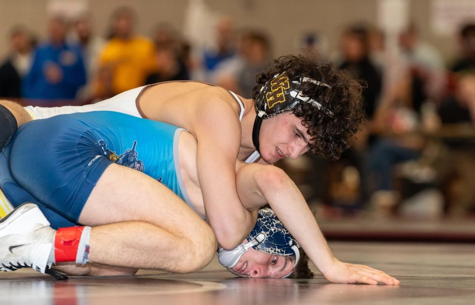 Watchung Hills Regional’s Anthony DiAndrea beats Arthur Johnson’s Zachary Belverio in the 113 lb. weight class in the Region 4 Wrestling Tournament Finals on Feb. 24, 2024 afternoon at Union High School in Union.