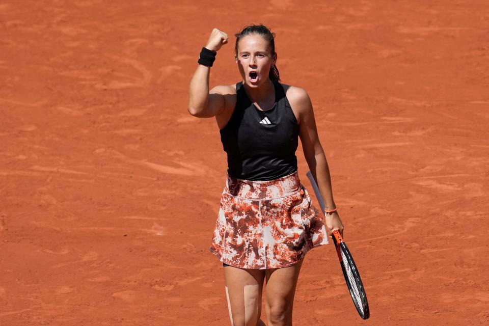 Russia's Daria Kasatkina celebrates winning her second round match at the French Open against Marketa Vondrousova of the Czech Republic in two sets, 6-3, 6-4, at the Roland Garros on May 31.