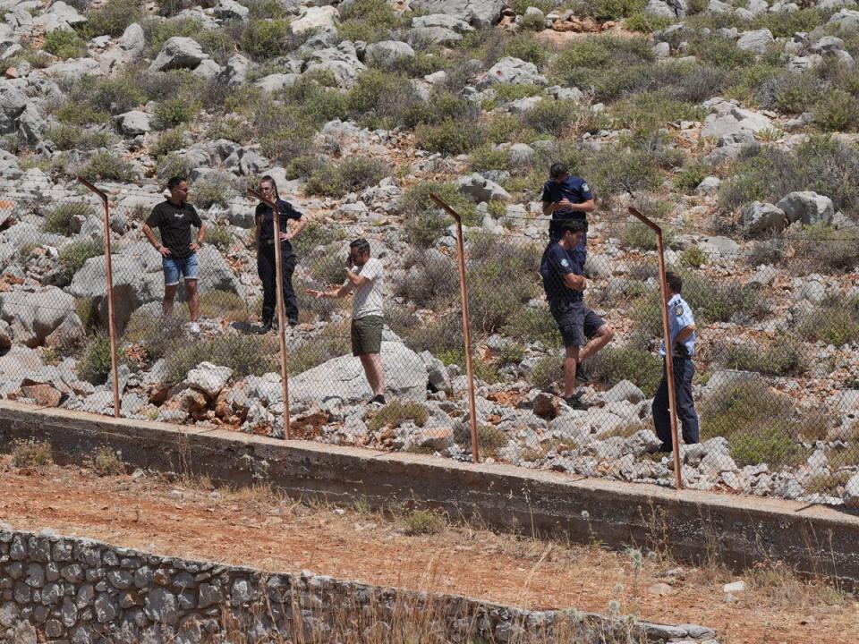 Rescue workers pictured near the site where a body has been discovered in the search for Dr Mosley (Yui Mok/PA Wire)