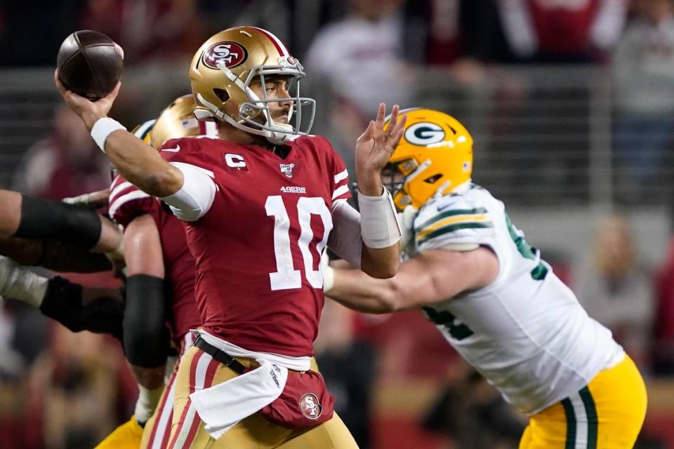San Francisco 49ers quarterback Jimmy Garoppolo (10) passes against the Green Bay Packers during the second half of the NFL NFC Championship football game. The 49ers play the Kansas City Chiefs in the Super Bowl.