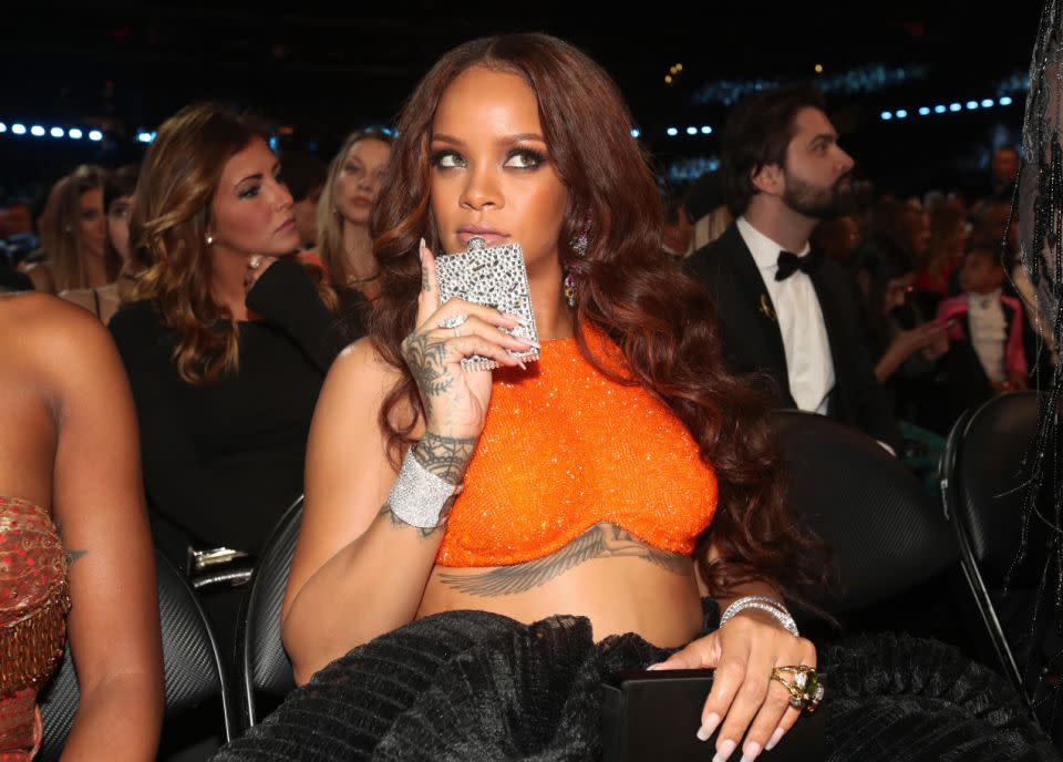 Rihanna famously posed with her diamond flask at last year's Grammys. Source: Getty